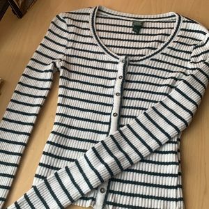 Long sleeve button up striped shirt.